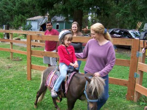Picture of a youth riding and learning others care.