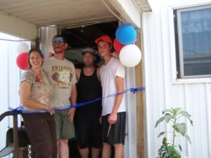 Picture of Grand Opening's cutting the ribbon.